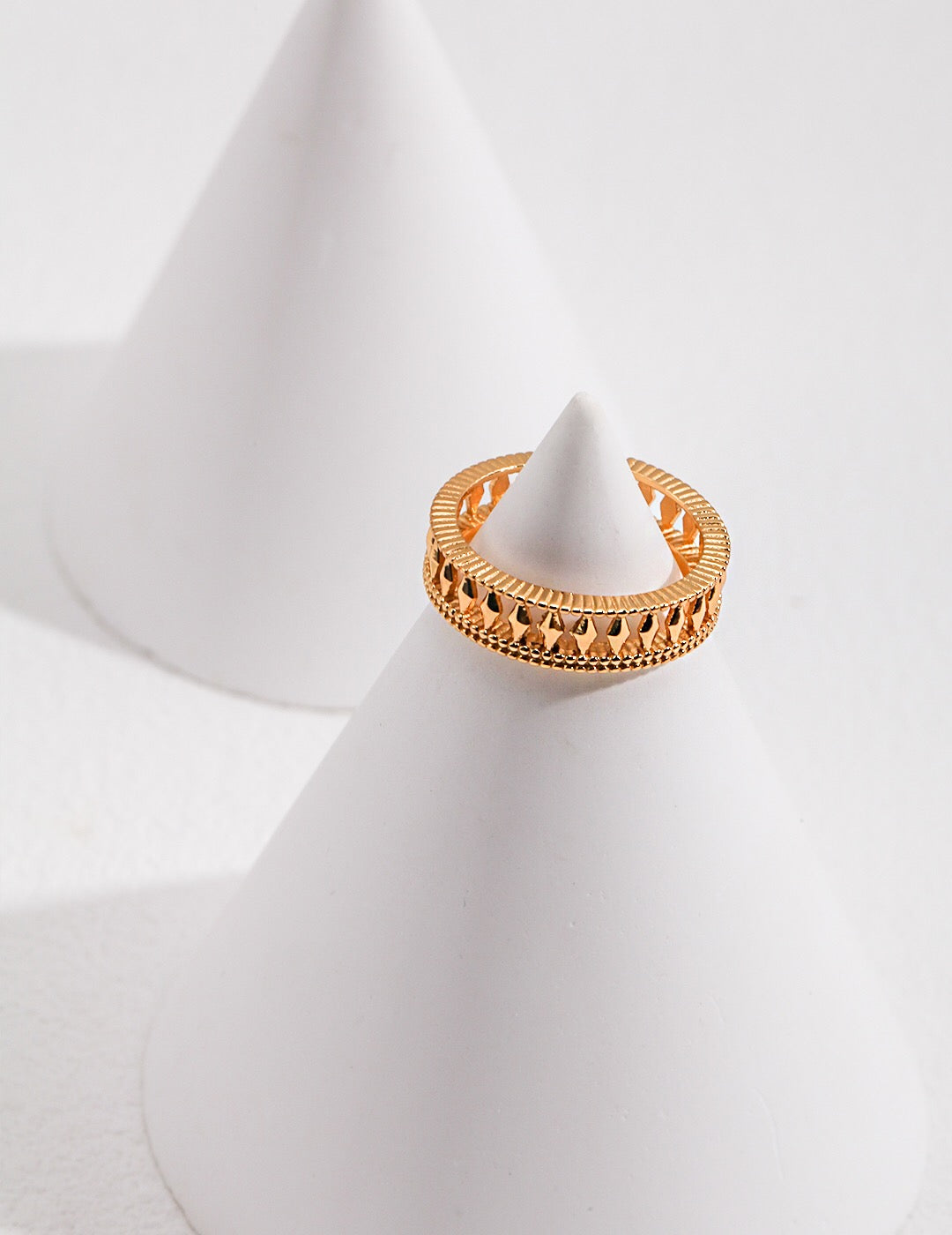 Minimalist Style Hollow Ring made of sterling silver and gold vermeil, showcasing its elegant design and craftsmanship.