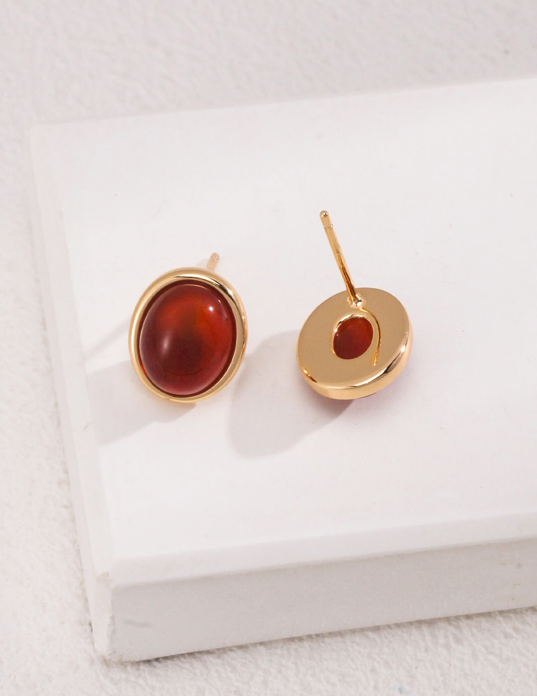 Minimalist Tiger Eye and Onyx Stud Earrings with gold vermeil setting, showcasing natural stones and elegant design.