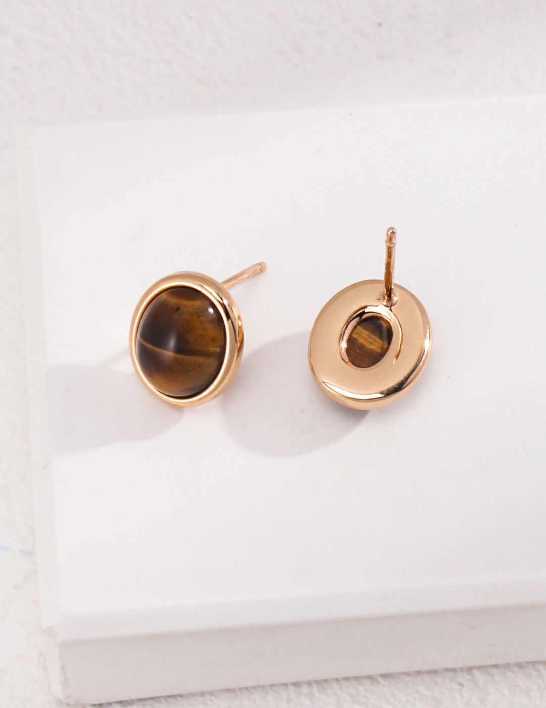 Minimalist Tiger Eye and Onyx Stud Earrings with gold vermeil setting, showcasing natural stones and elegant design.