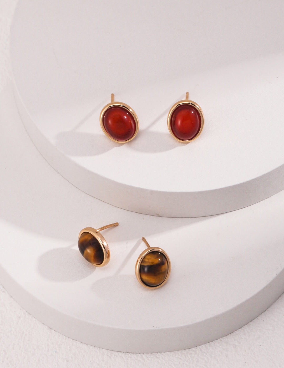 Minimalist Tiger Eye and Onyx Stud Earrings with gold vermeil setting, showcasing natural stones and elegant design.