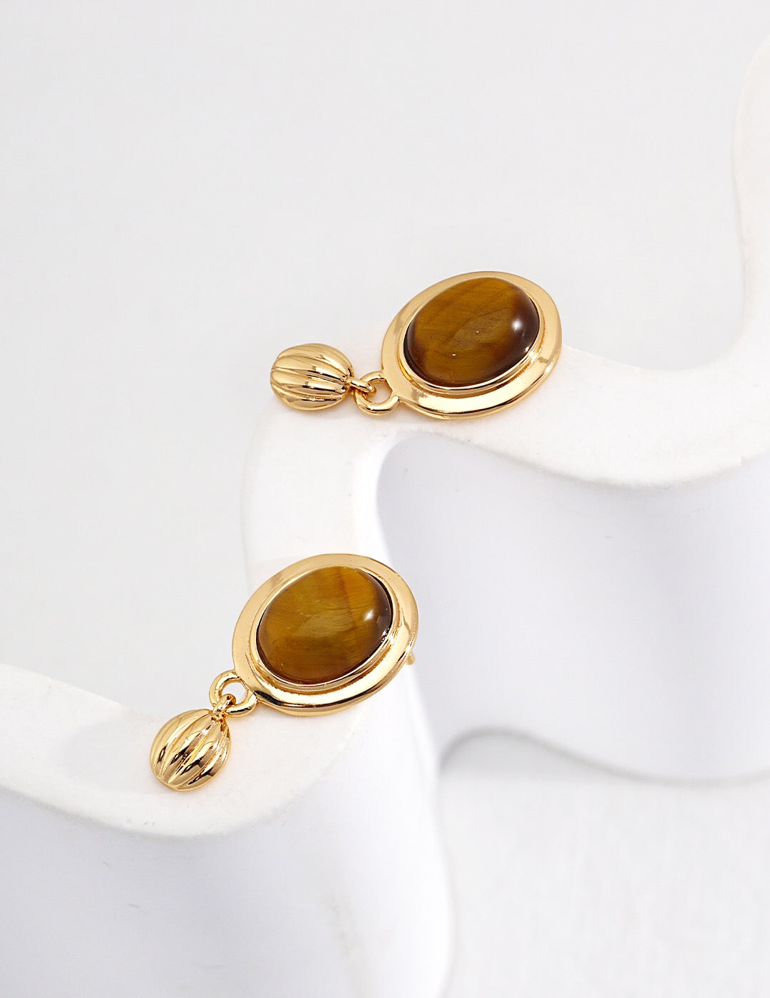 Minimalist Oval Tiger Eye Stone Pendant Earrings featuring a natural tiger eye stone set in sterling silver and gold vermeil.