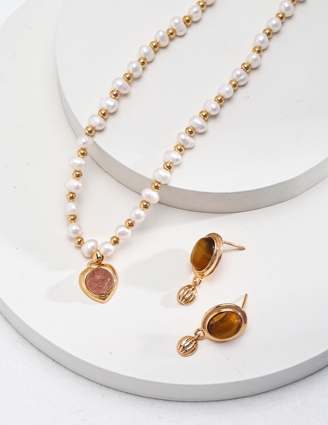 Minimalist Oval Tiger Eye Stone Pendant Earrings featuring a natural tiger eye stone set in sterling silver and gold vermeil.