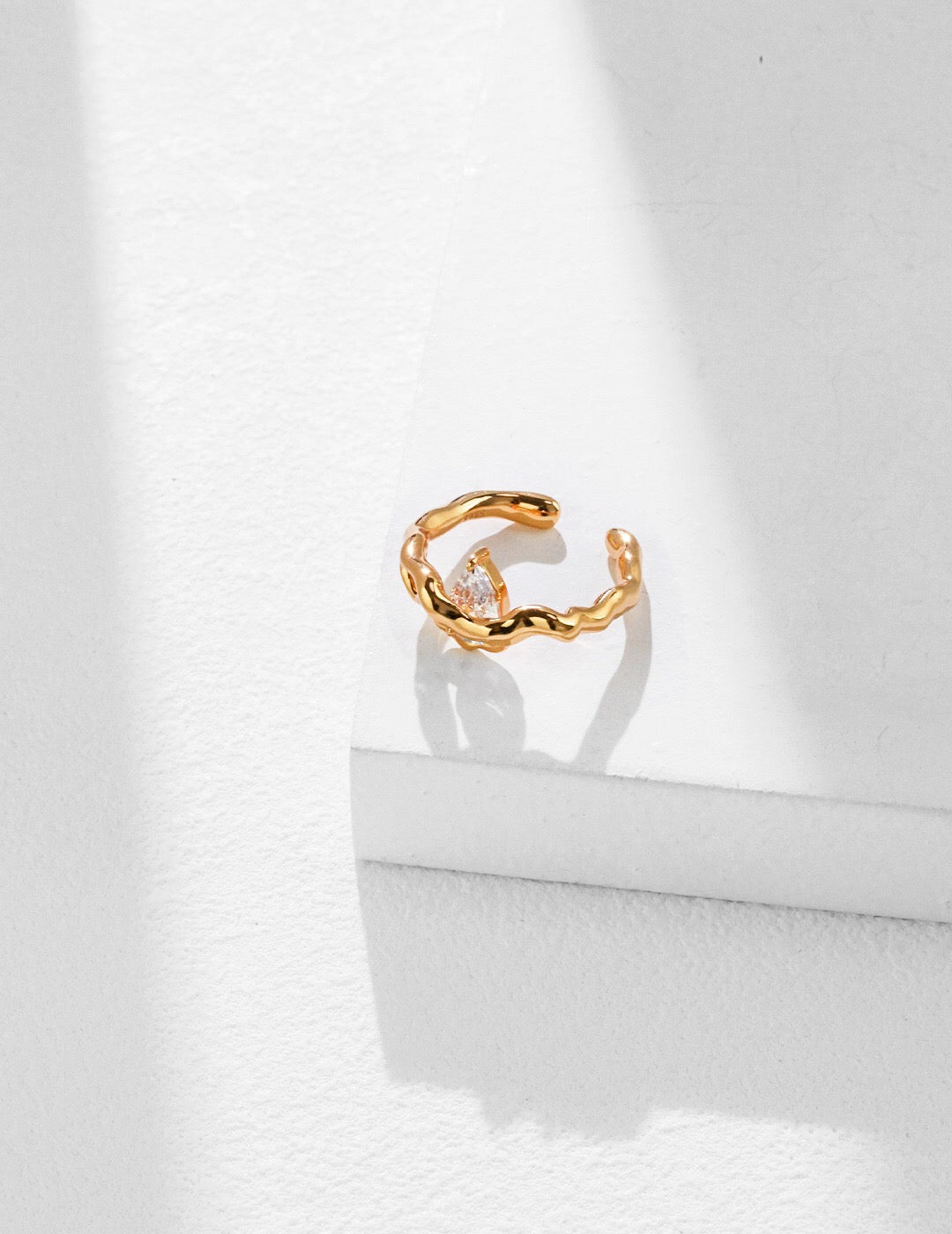 Minimalist Zircon Open Ring featuring a delicate design with zircon stones and gold vermeil plating, adjustable size for comfort.