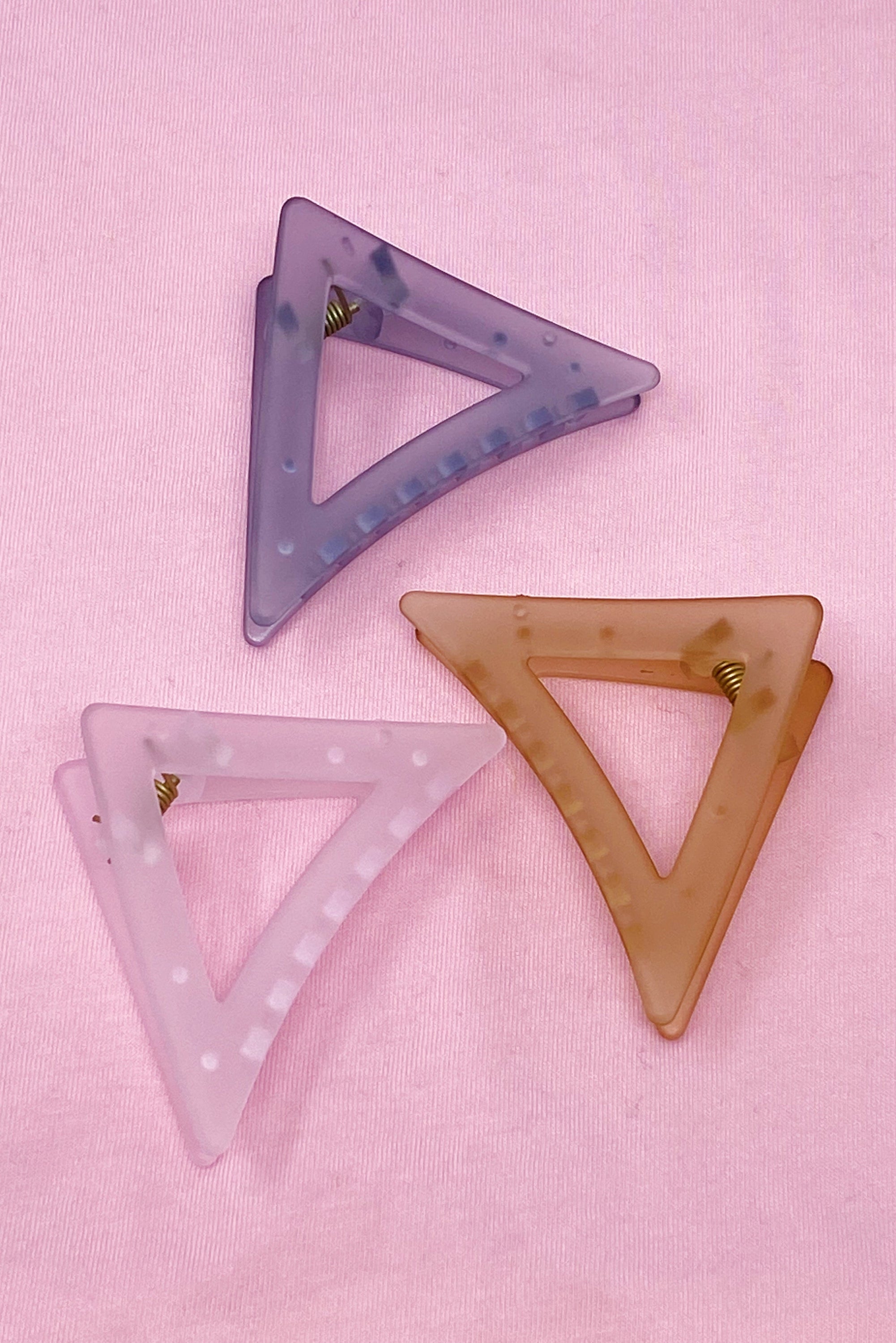 Mistic Splash Hair Claw Set featuring sleek acrylic clips in a unique triangle shape, perfect for securing half of your hair.