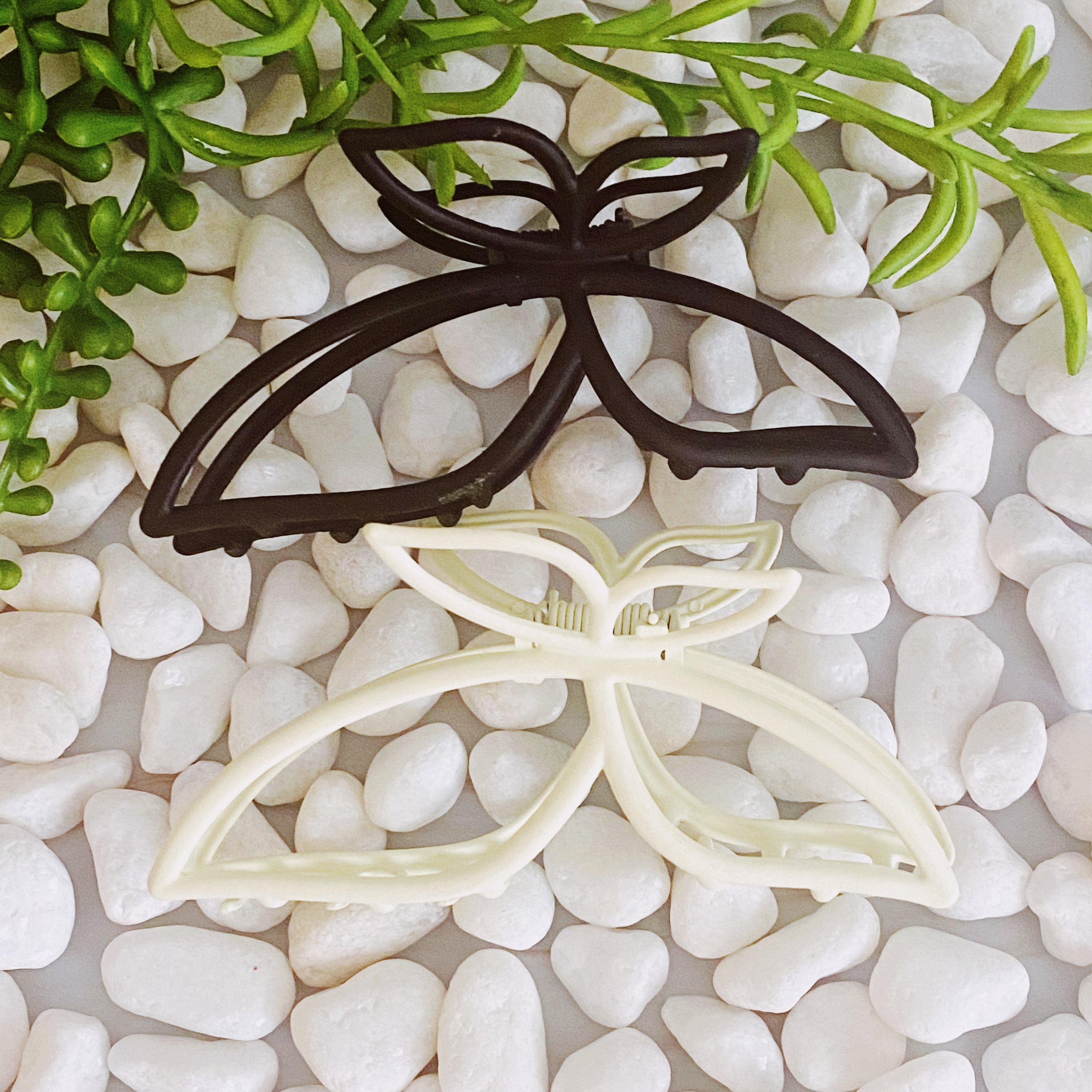 Modern Butterfly Hair Claw Set of 2 featuring elegant design and sturdy construction, ideal for securing hair stylishly.