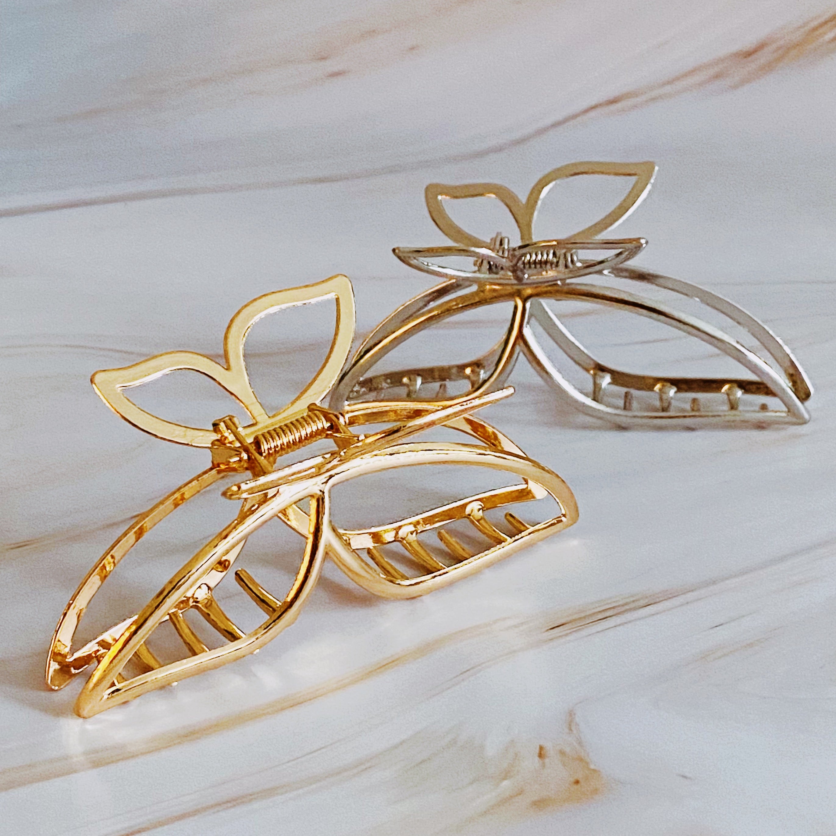 Modern Butterfly Hair Claw Set of 2 featuring elegant design and sturdy construction, ideal for securing hair stylishly.