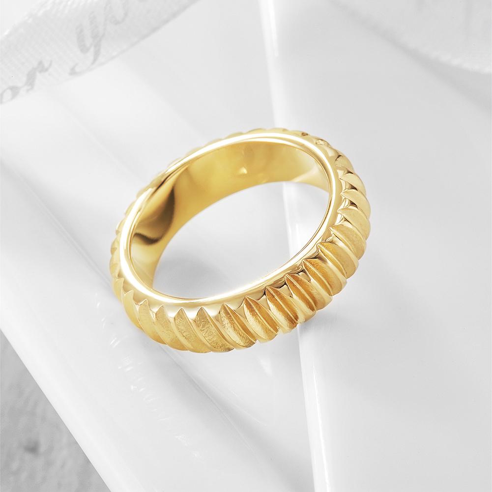 A stylish Modern Ribbed Ring made of 316L surgical stainless steel with 14K gold PVD plating, showcasing a contemporary ribbed design.