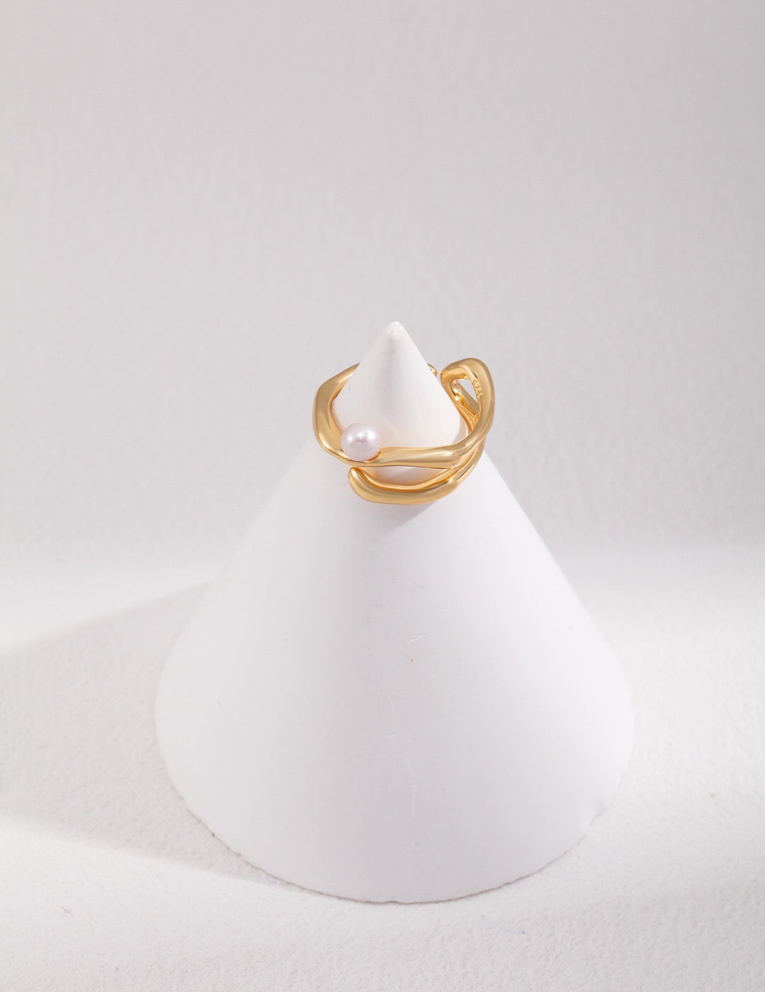 A stunning Modern Statement Pearl Ring featuring natural freshwater pearls set in tarnish-resistant sterling silver and gold vermeil.