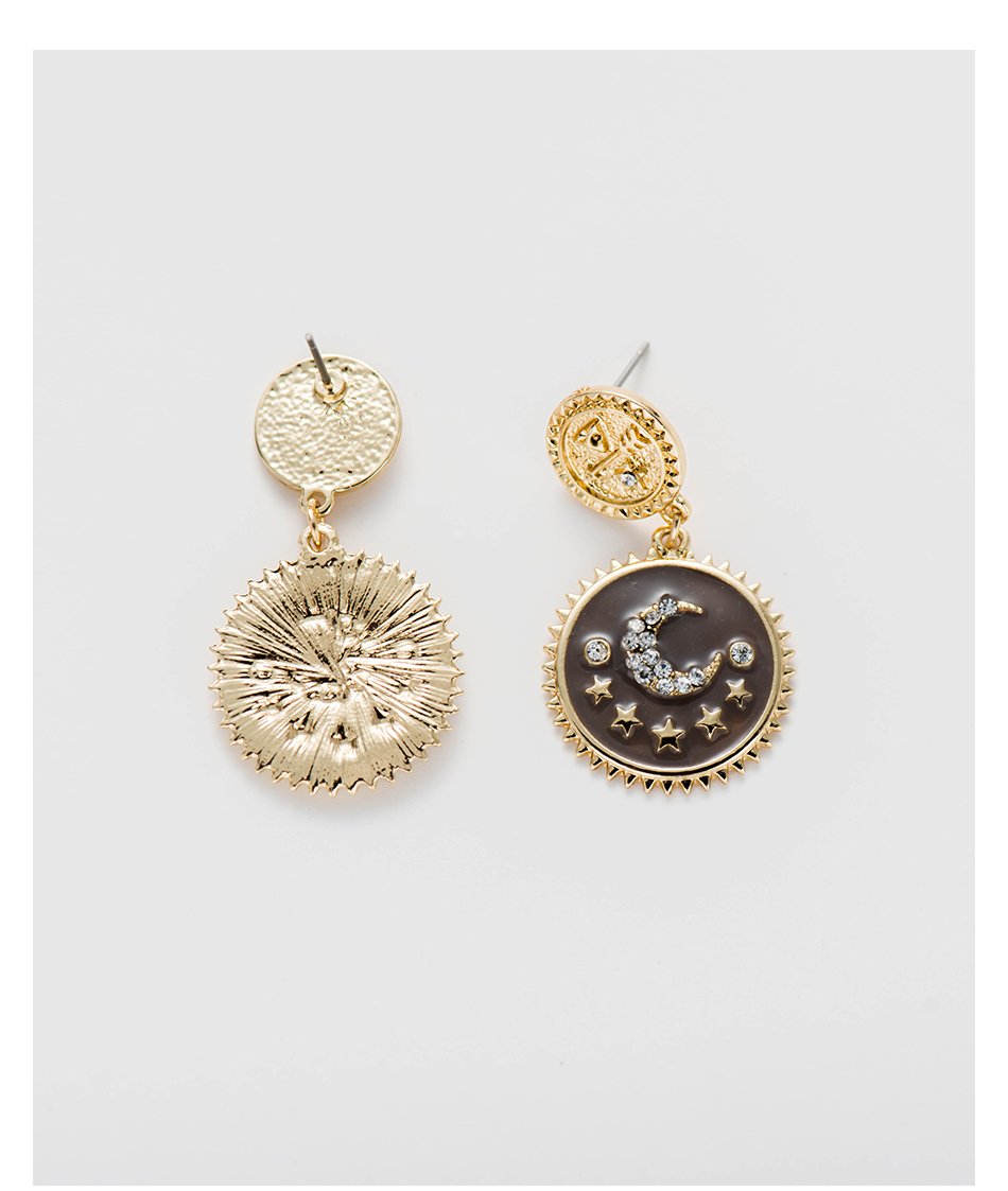 Elegant gold plated moon and star dangle earrings, showcasing intricate design and lightweight structure.