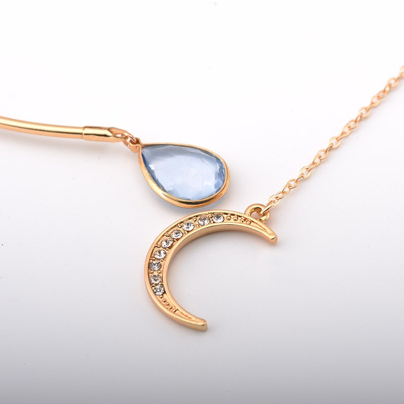 Moon and WaterDrop Choker Necklace featuring alloy and rhinestone materials, showcasing a celestial design with a moon and waterdrop elements.