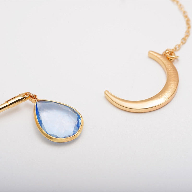 Moon and WaterDrop Choker Necklace featuring alloy and rhinestone materials, showcasing a celestial design with a moon and waterdrop elements.