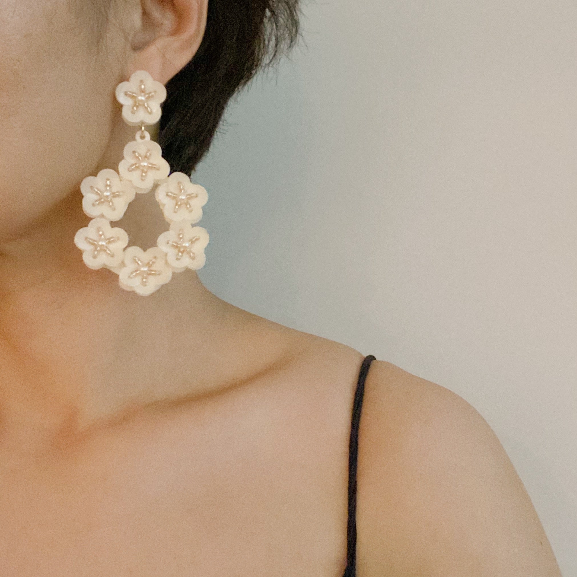 Moon Flower Earrings featuring intricate sequin and bead detailing, lightweight design, and elegant statement style.