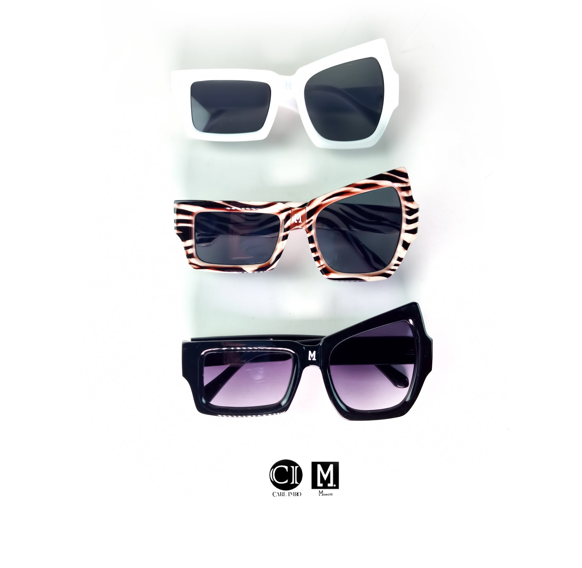 Three pairs of stylish sunglasses.