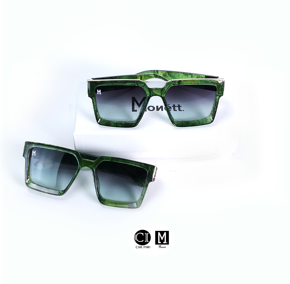 Green square-shaped sunglasses display.