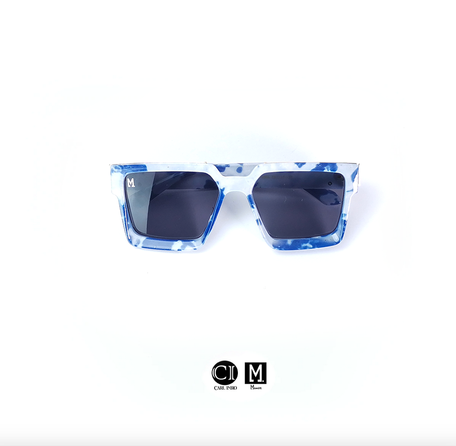 Monett Manifesto MarBlu sunglasses featuring a stylish square frame, lightweight plastic lenses, and a signature box.