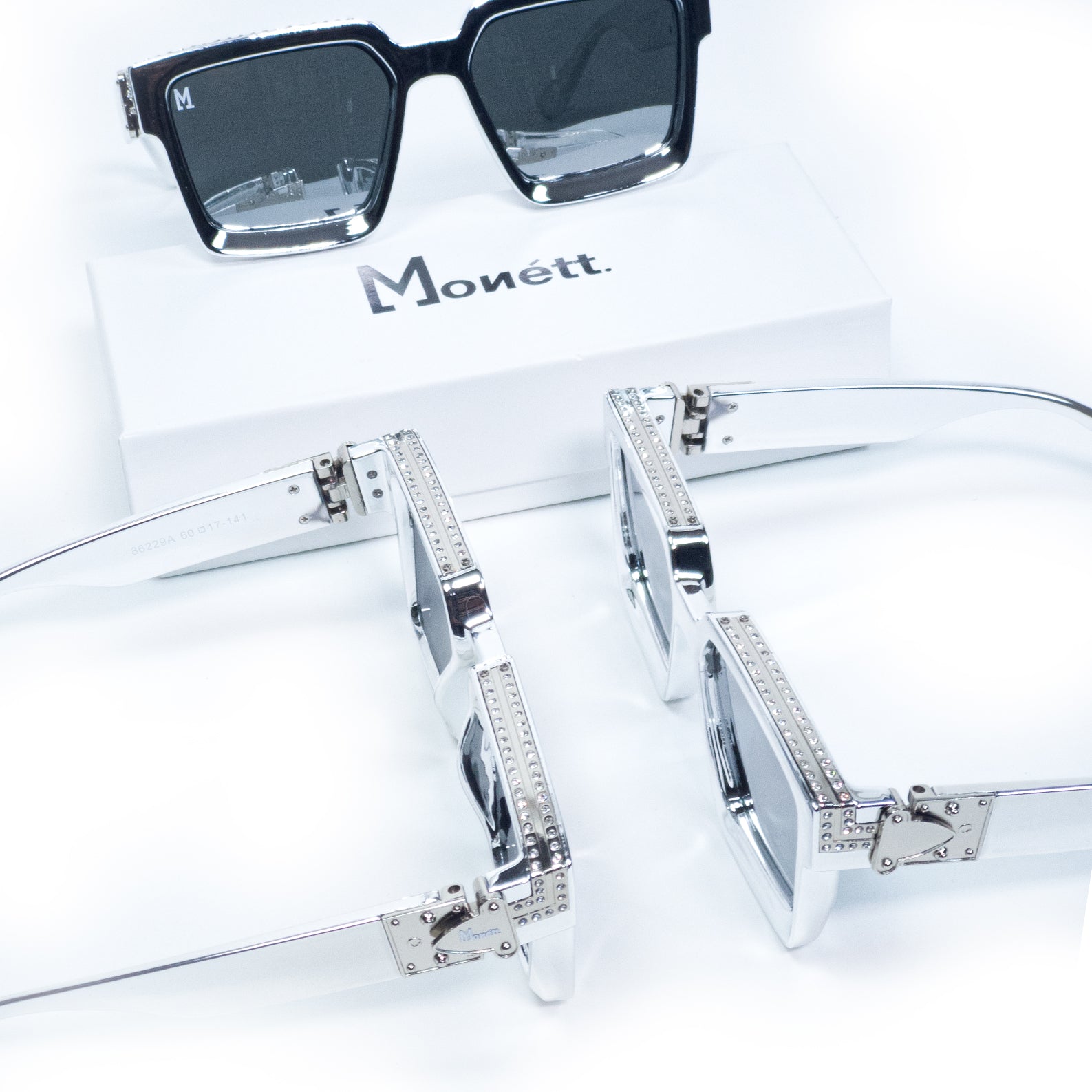 Monett Manifesto Platta sunglasses featuring a stylish square design, lightweight plastic frame, and UV400 protection.