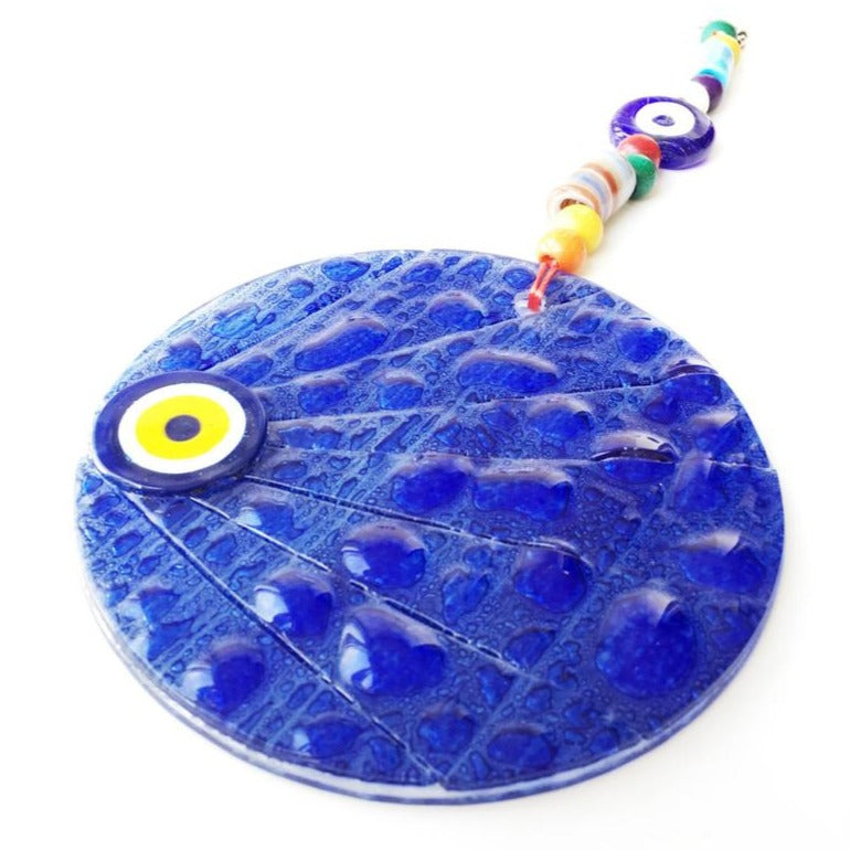 Handmade mosaic glass evil eye wall hanging, featuring vibrant colors and intricate designs, measuring 12cm x 12cm.