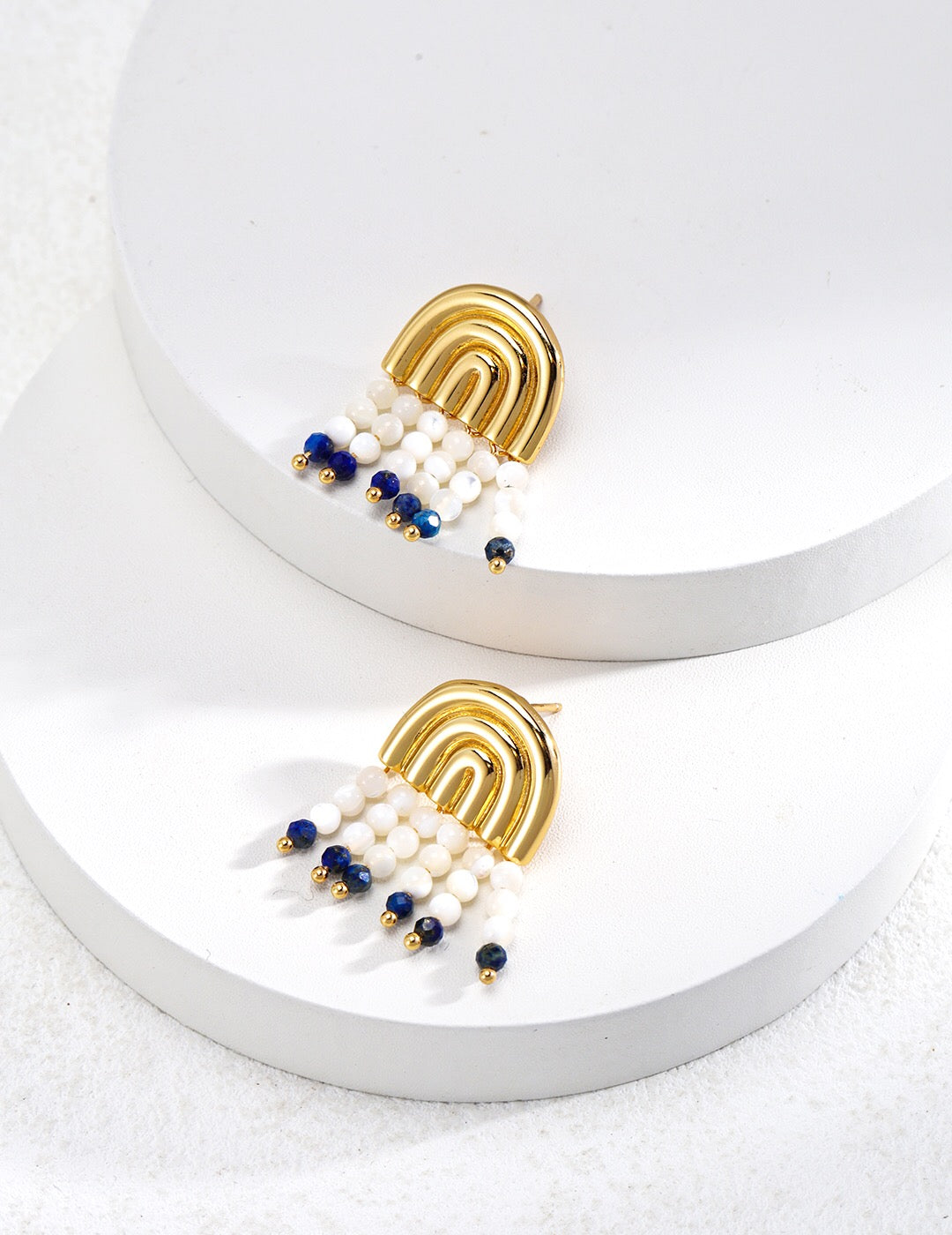 Elegant Mother-of-Pearl Lapis Lazuli Earrings featuring gold vermeil, showcasing a unique handcrafted design.