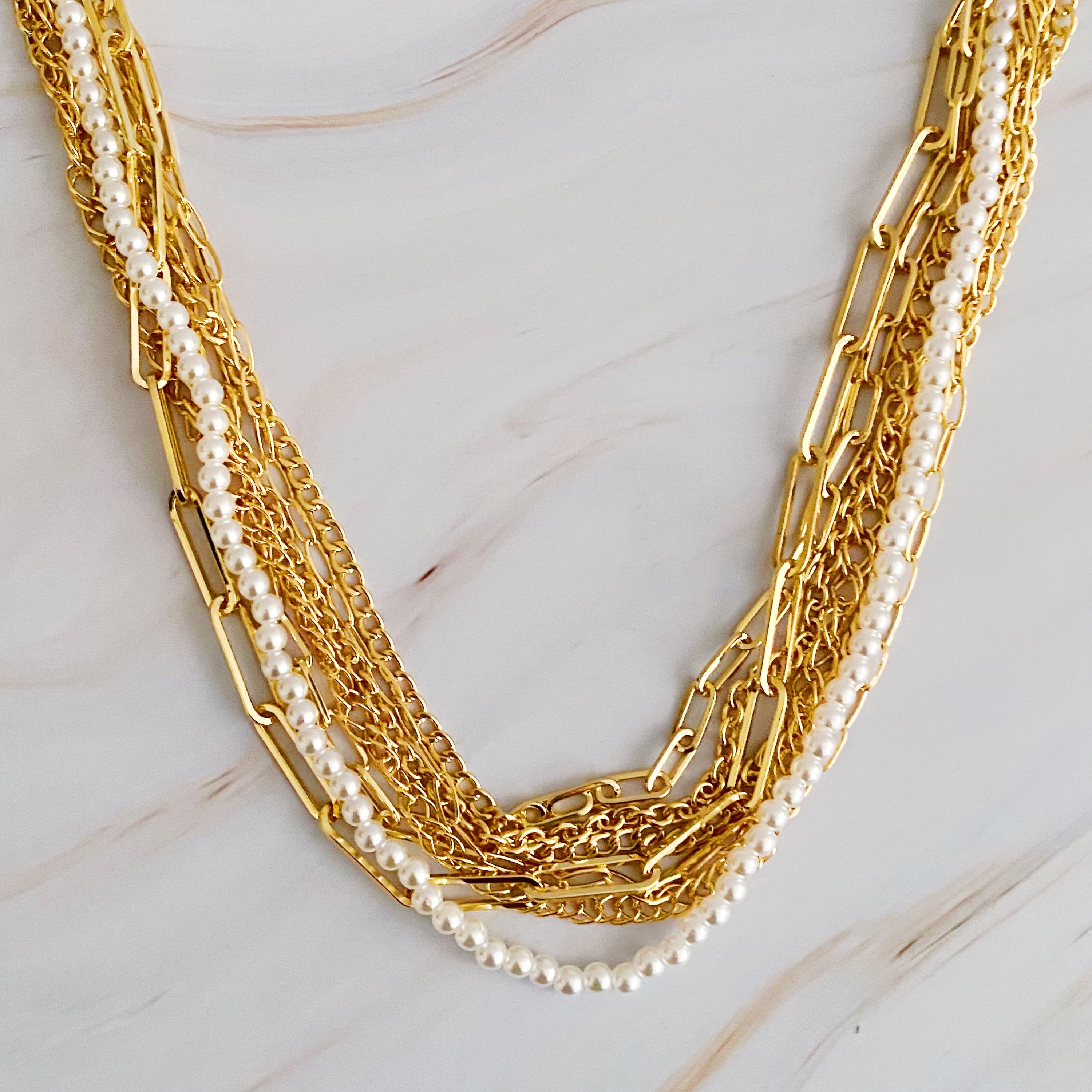 Multi Chain Pearl Necklace featuring delicate acrylic pearls and 18k gold plated alloy chains, perfect for elegant styling.