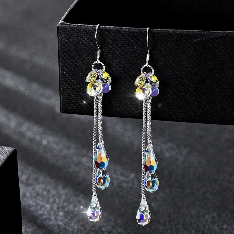 Elegant Multi-Crystal Long Earrings with Tassel, showcasing shimmering artificial crystals.