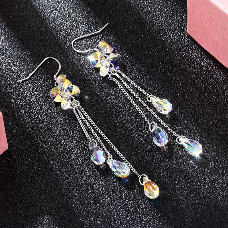 Elegant Multi-Crystal Long Earrings with Tassel, showcasing shimmering artificial crystals.