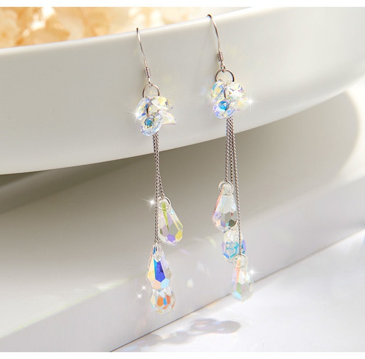 Elegant Multi-Crystal Long Earrings with Tassel, showcasing shimmering artificial crystals.