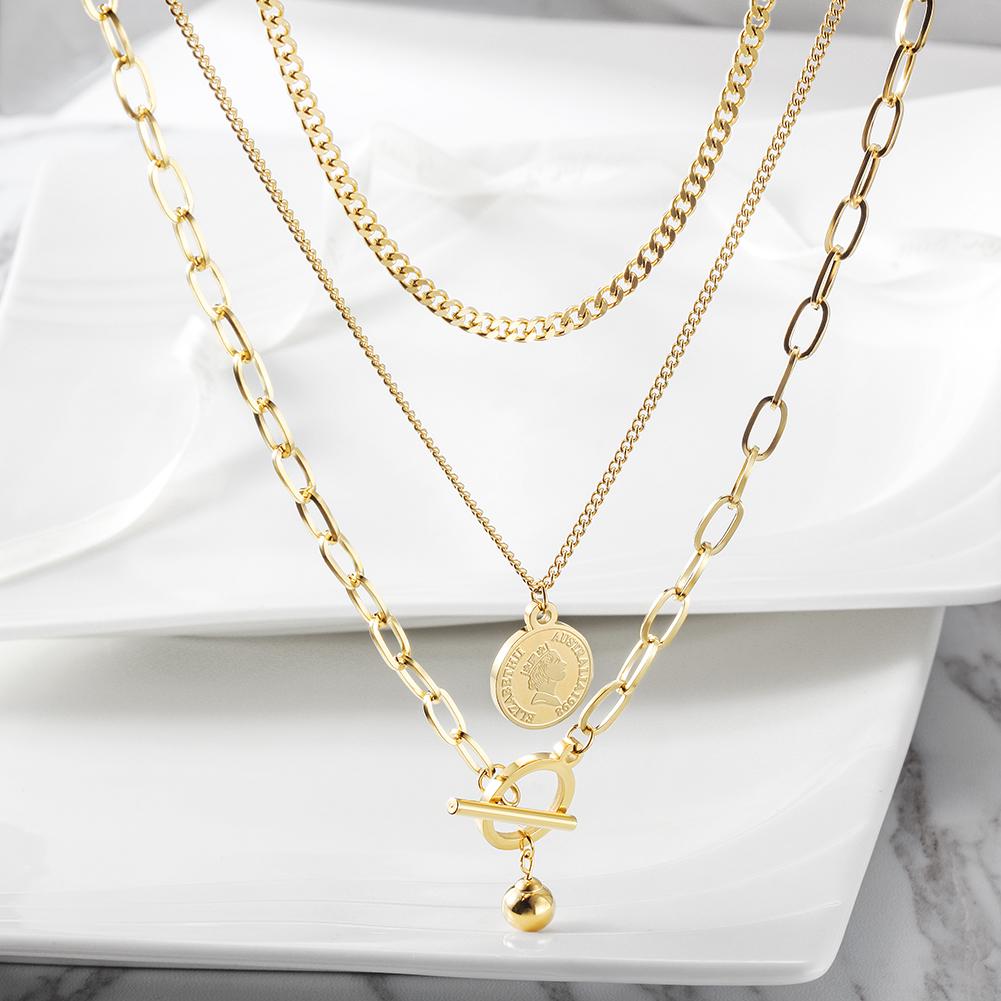 Multi-layered Elizabeth Coin Necklace made of surgical stainless steel with 14K gold plating, featuring a stylish coin pendant.