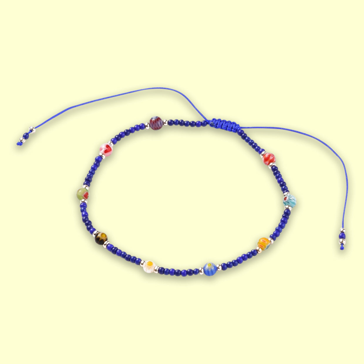 Murano Beaded Friendship Bracelet featuring colorful glass beads on an adjustable cord, perfect for gifting.