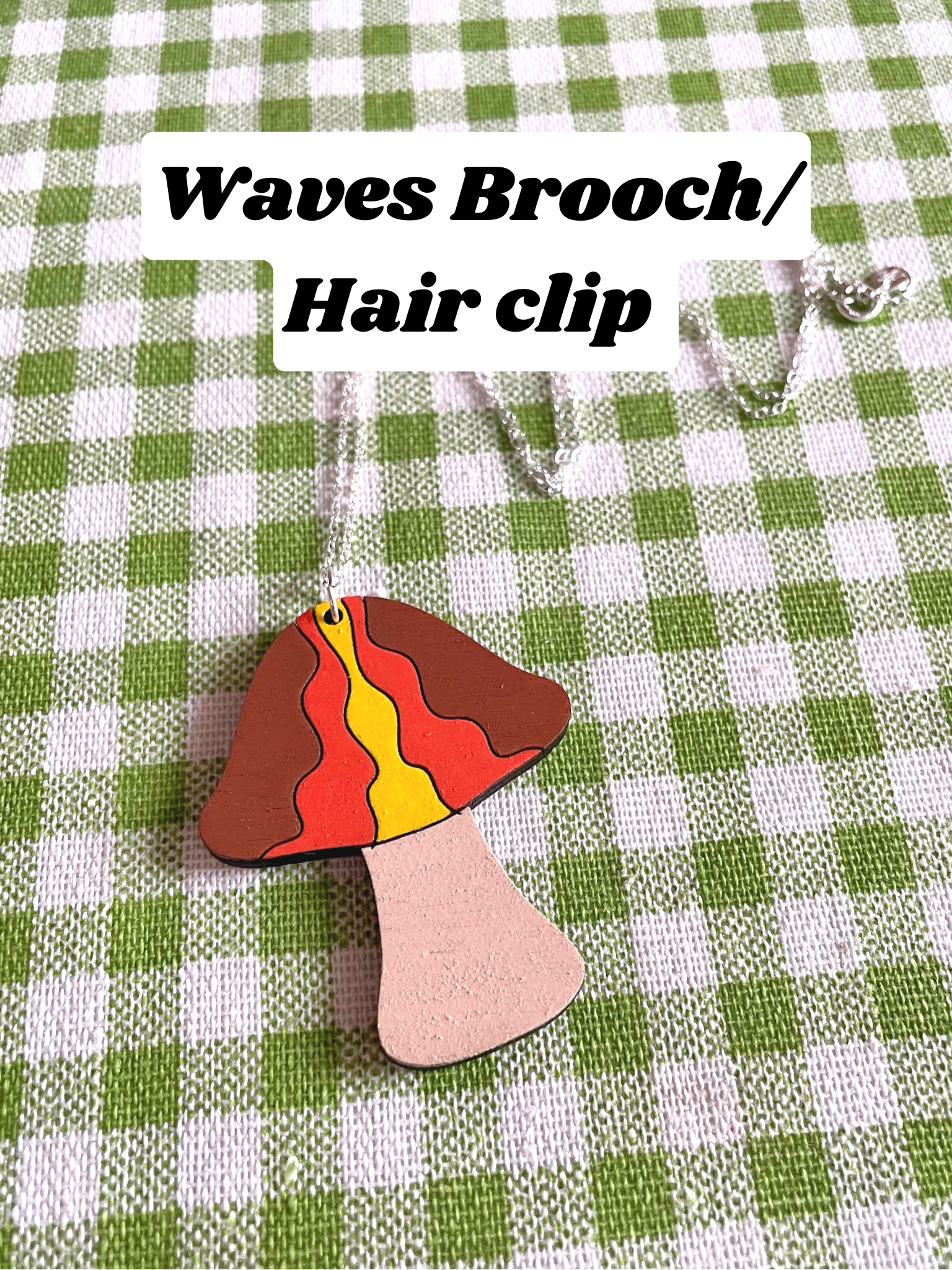 A stylish wooden Mushroom Brooch/Hairclip in Waves design, made from sustainable Birch Plywood, showcasing intricate laser-cut details.