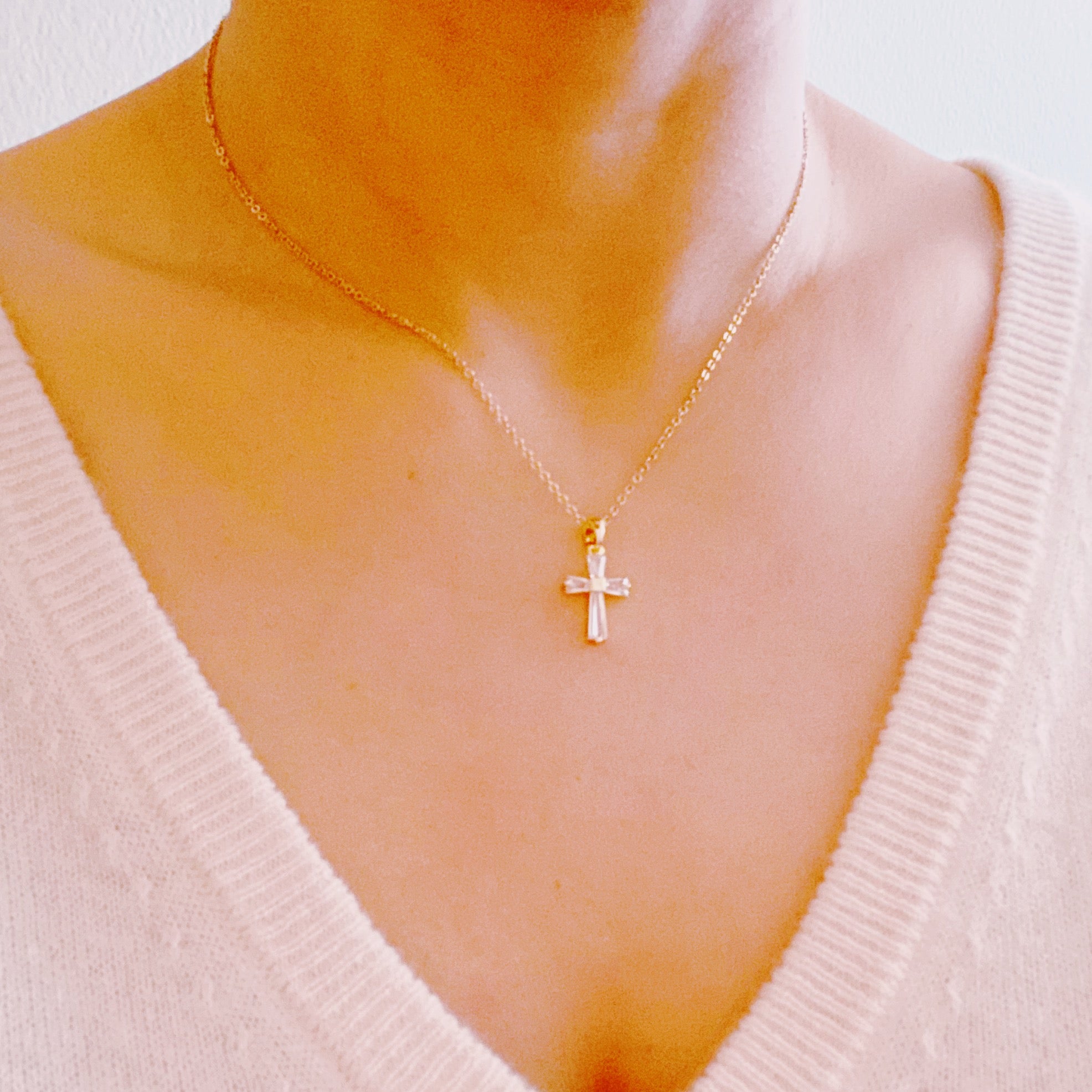 My Dear Crystal Cross Necklace featuring a clear crystal cross pendant on a delicate gold chain.