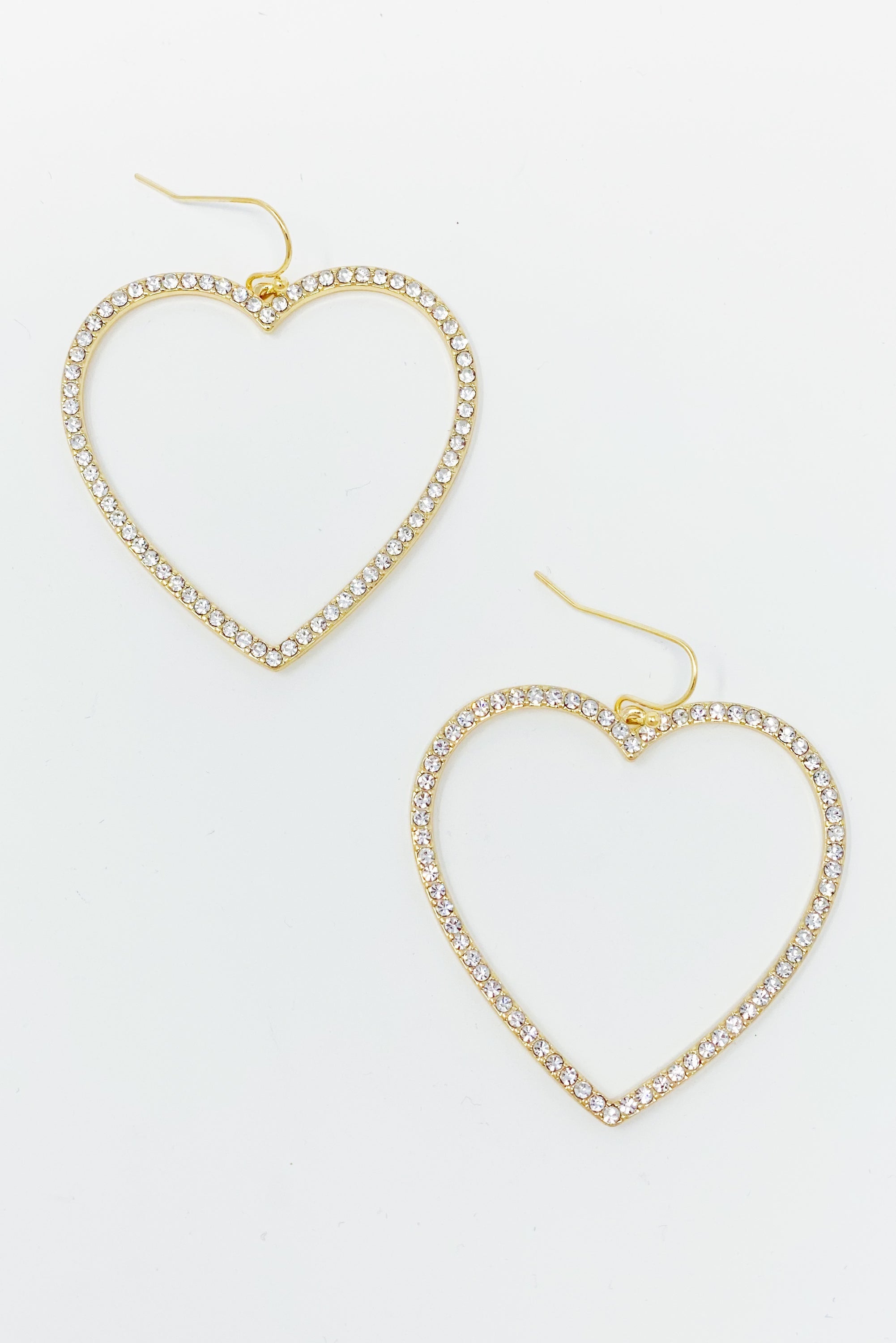 Gold heart earrings with cubic zirconia accents, featuring a fish hook design, measuring 2 inches by 2 inches.