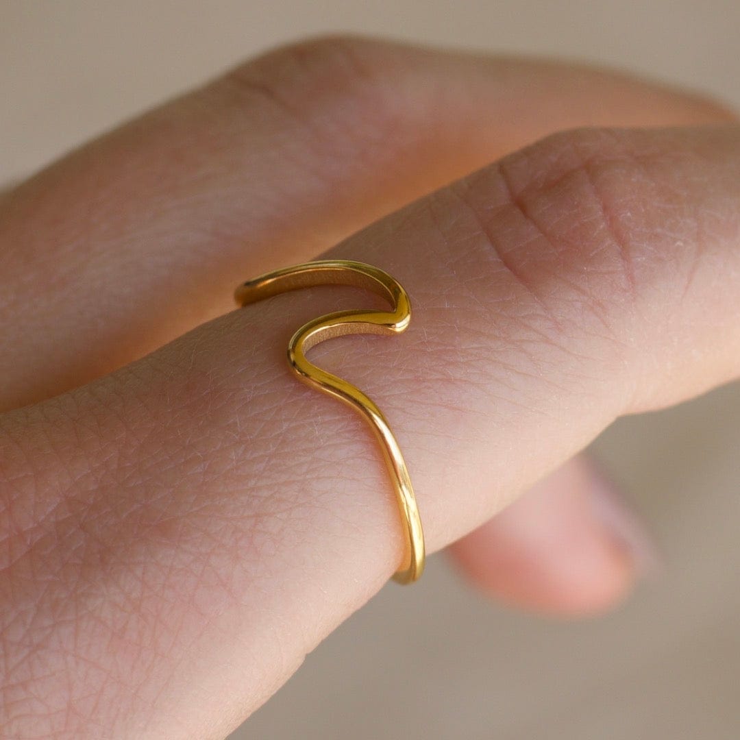 Mykonos Dainty Ocean Waved Line Stacking Ring in gold, showcasing its minimalist geometric design and cut-out wave line.