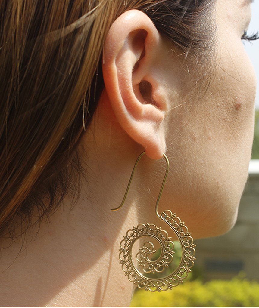 A pair of handmade Mystic Spiral Gold Earrings featuring intricate S-shaped designs, crafted from hypoallergenic materials.