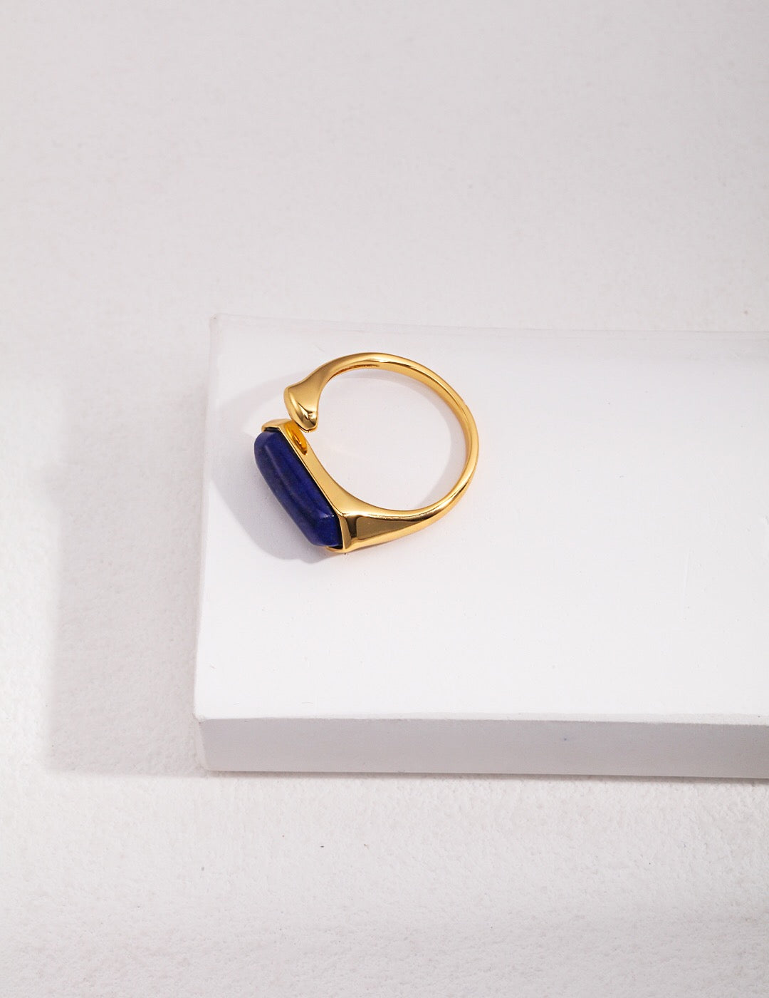 A handcrafted Natural Lapis Lazuli Ring featuring a deep blue lapis lazuli stone set in gold vermeil, showcasing its elegant design.