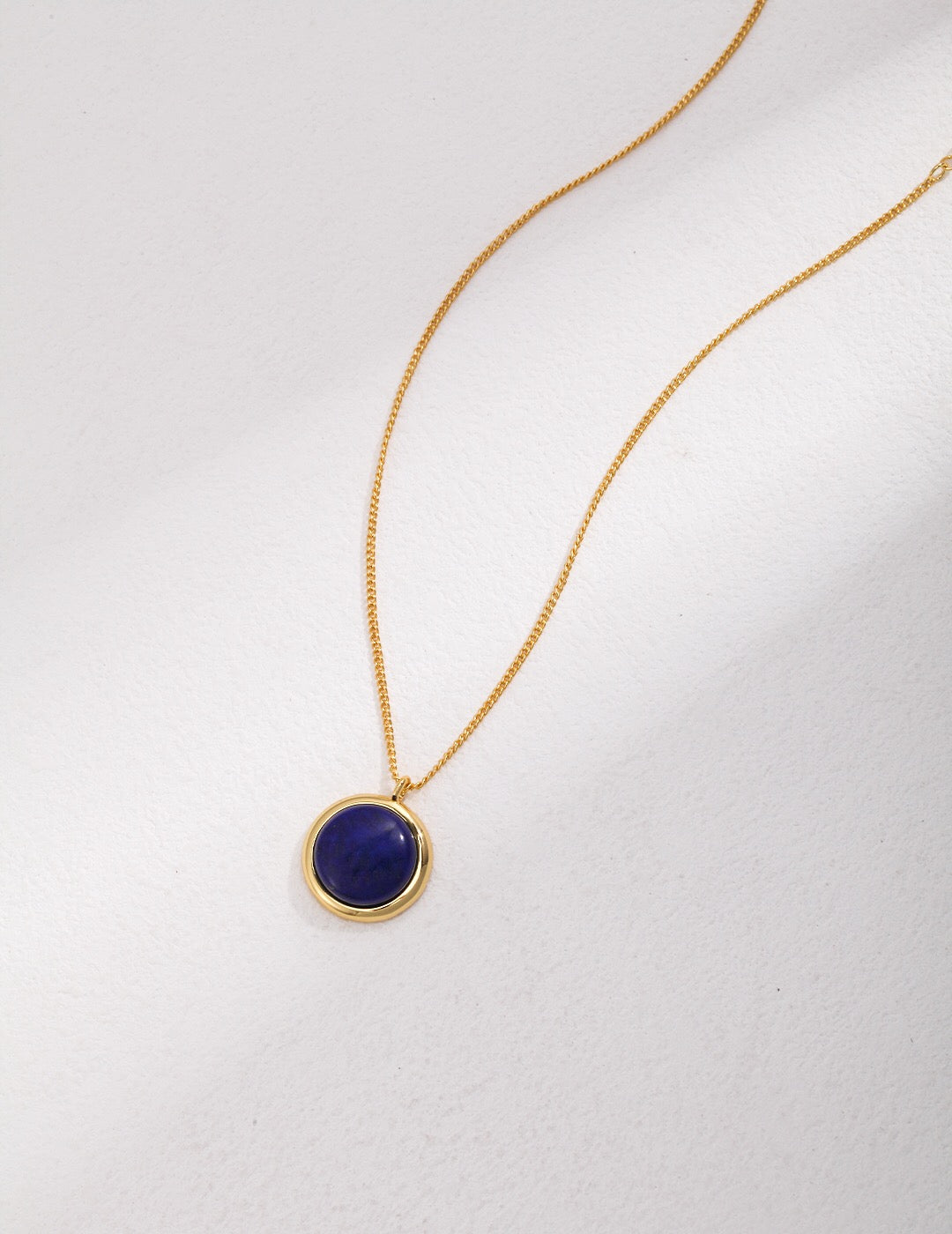 Natural Lapis Lazuli Stone Round Necklace with gold vermeil chain, showcasing a deep blue pendant.