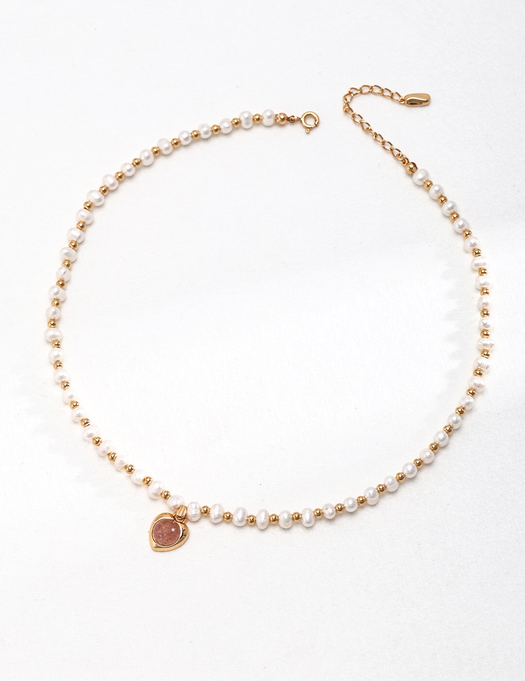 Natural Pink Strawberry Crystal Pearl Necklace featuring pink crystals and natural pearls with gold vermeil accents.