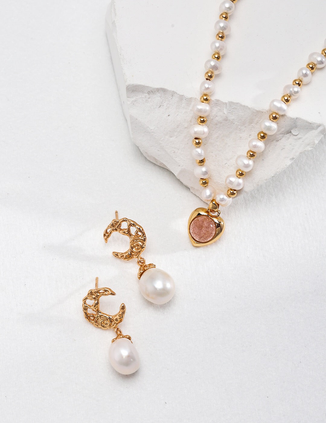 Natural Pink Strawberry Crystal Pearl Necklace featuring pink crystals and natural pearls with gold vermeil accents.