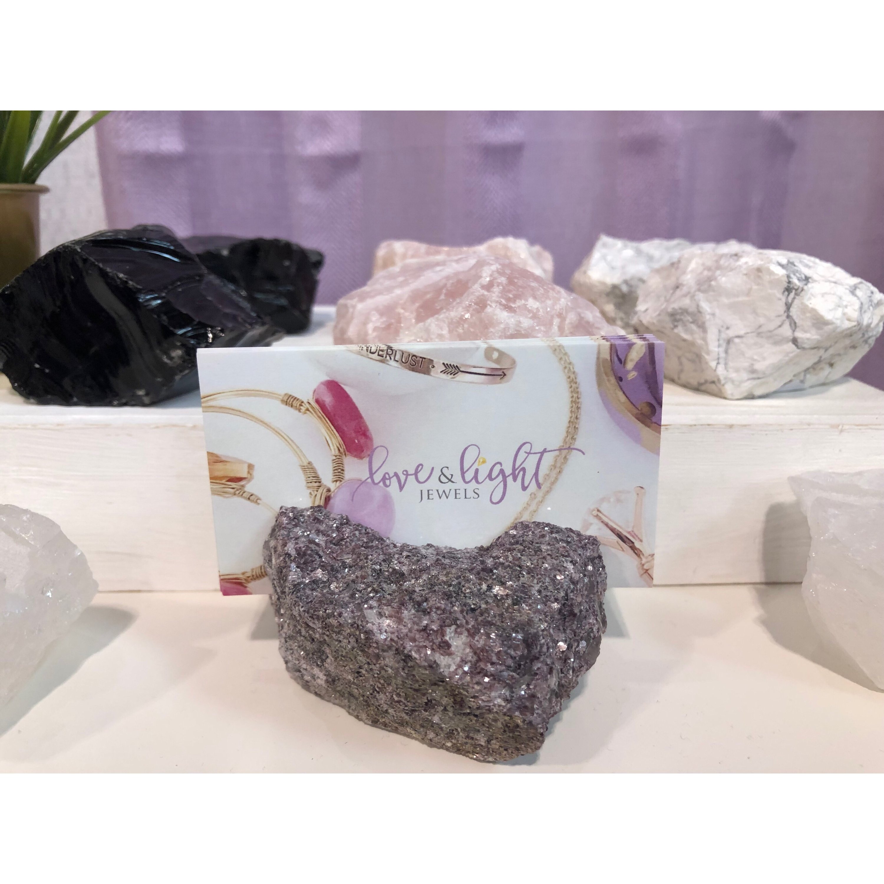 Natural Stone Card Holder featuring unique stones like Lepidolite, Rose Quartz, and Obsidian, showcasing its elegant design and natural variations.