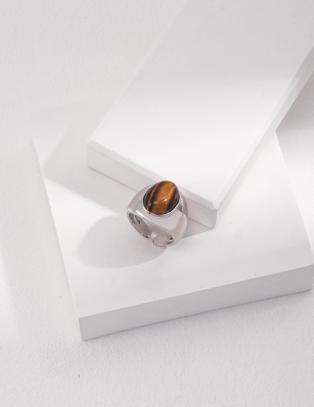 Natural Tiger's Eye Stone Ring featuring sterling silver and gold vermeil, showcasing a beautiful gemstone in an adjustable design.