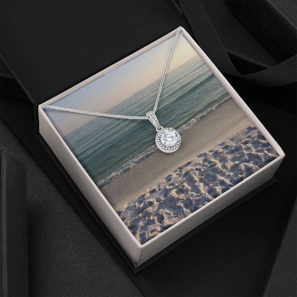 Eternal Hope Necklace featuring a cushion cut cubic zirconia and accent CZ crystals, elegantly displayed in a soft touch gift box.