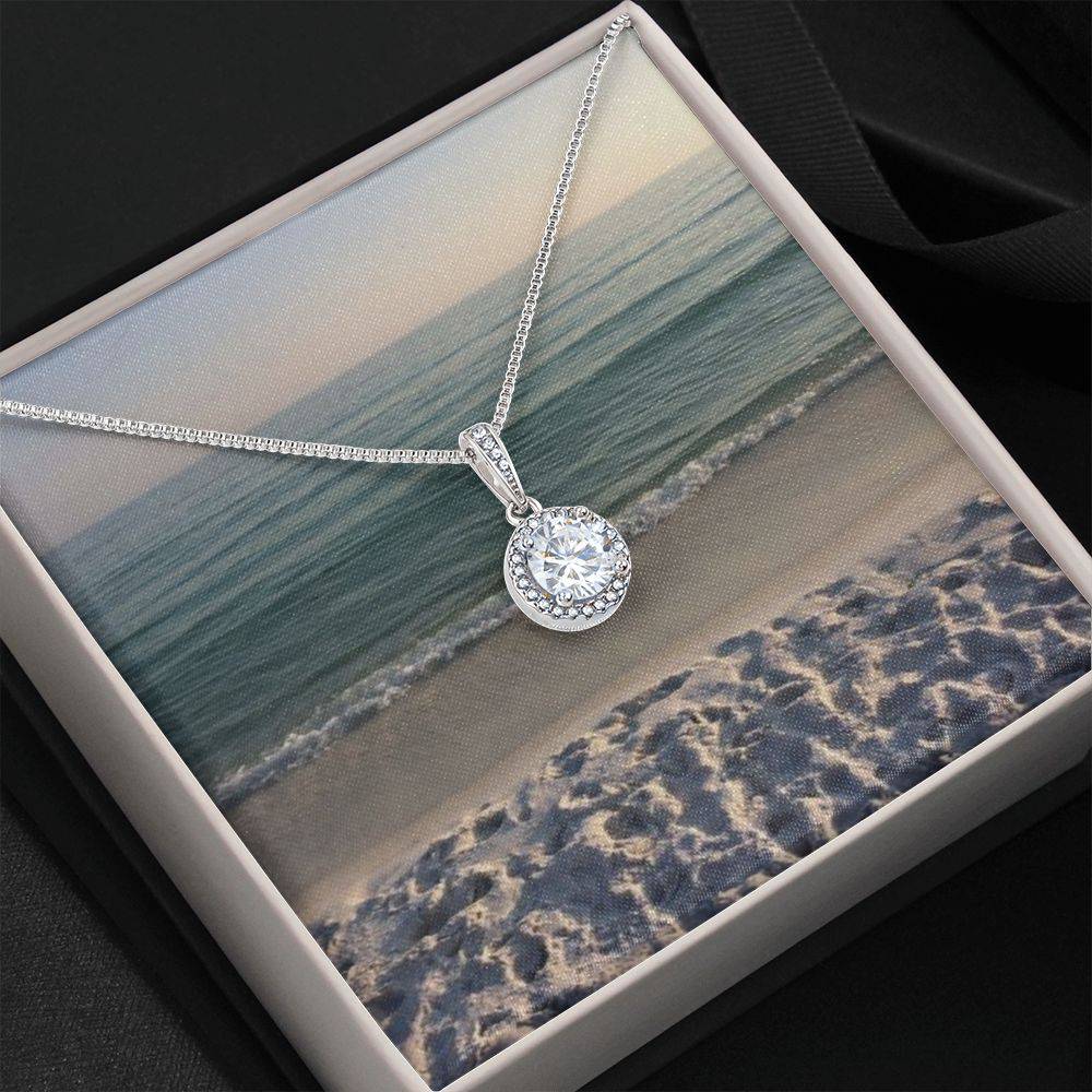 Eternal Hope Necklace featuring a cushion cut cubic zirconia and accent CZ crystals, elegantly displayed in a soft touch gift box.