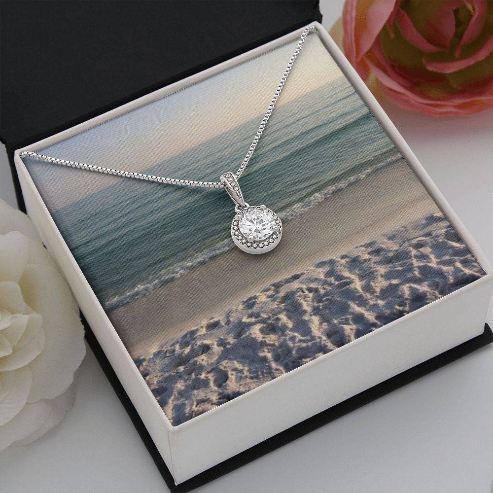 Eternal Hope Necklace featuring a cushion cut cubic zirconia and accent CZ crystals, elegantly displayed in a soft touch gift box.