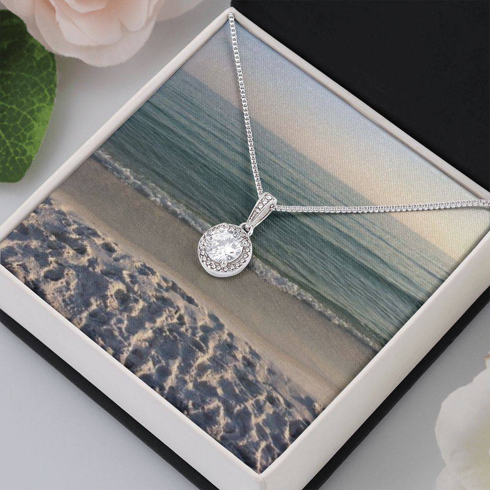 Eternal Hope Necklace featuring a cushion cut cubic zirconia and accent CZ crystals, elegantly displayed in a soft touch gift box.