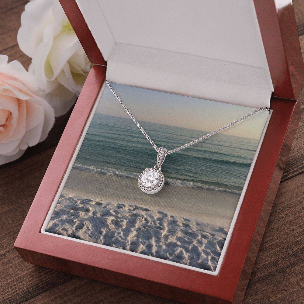 Eternal Hope Necklace featuring a cushion cut cubic zirconia and accent CZ crystals, elegantly displayed in a soft touch gift box.