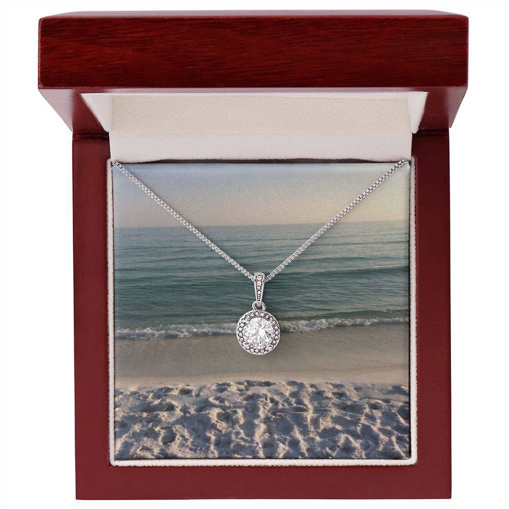 Eternal Hope Necklace featuring a cushion cut cubic zirconia and accent CZ crystals, elegantly displayed in a soft touch gift box.