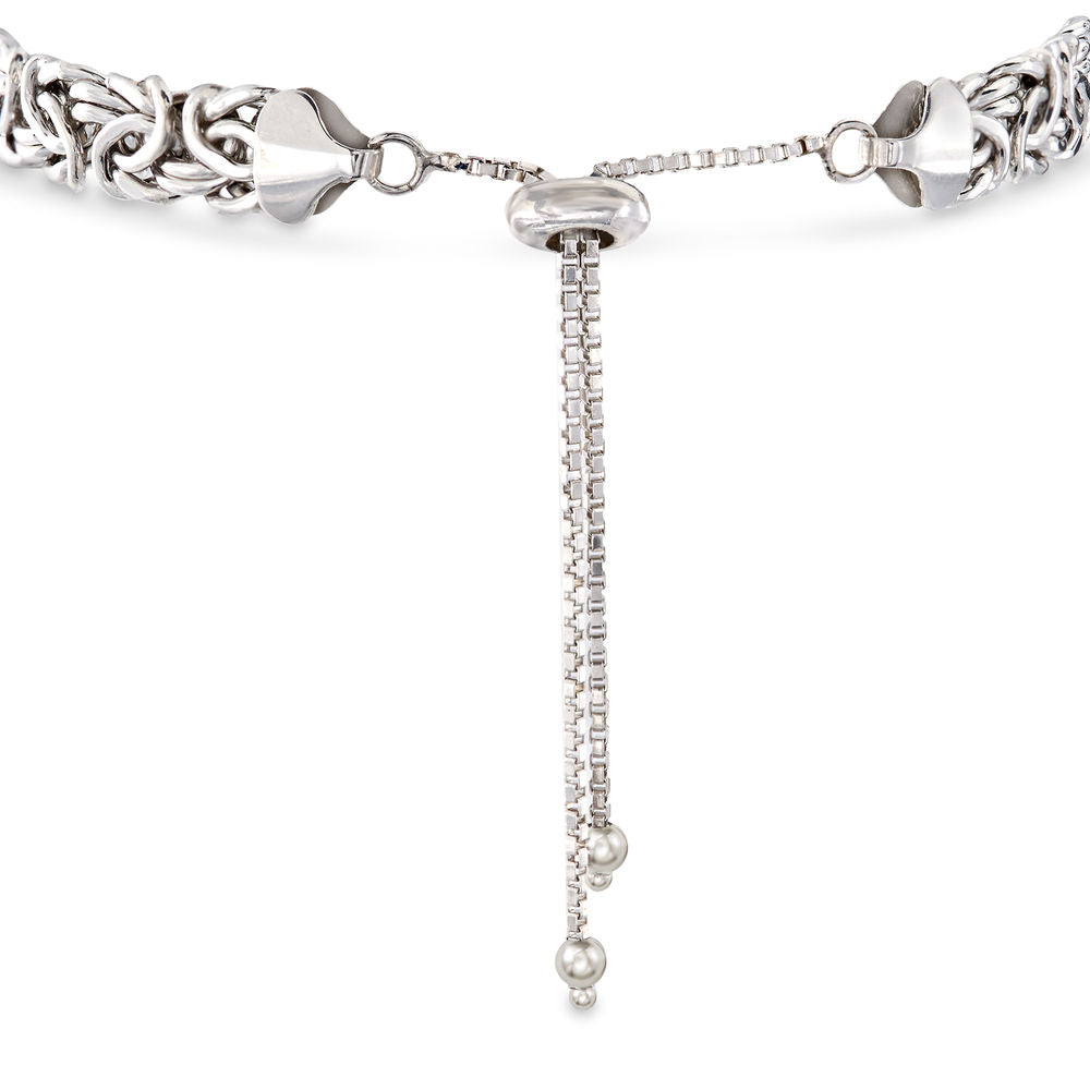 Elegant 14K white gold plated Byzantine design pull clasp bra, showcasing intricate patterns and a secure clasp.