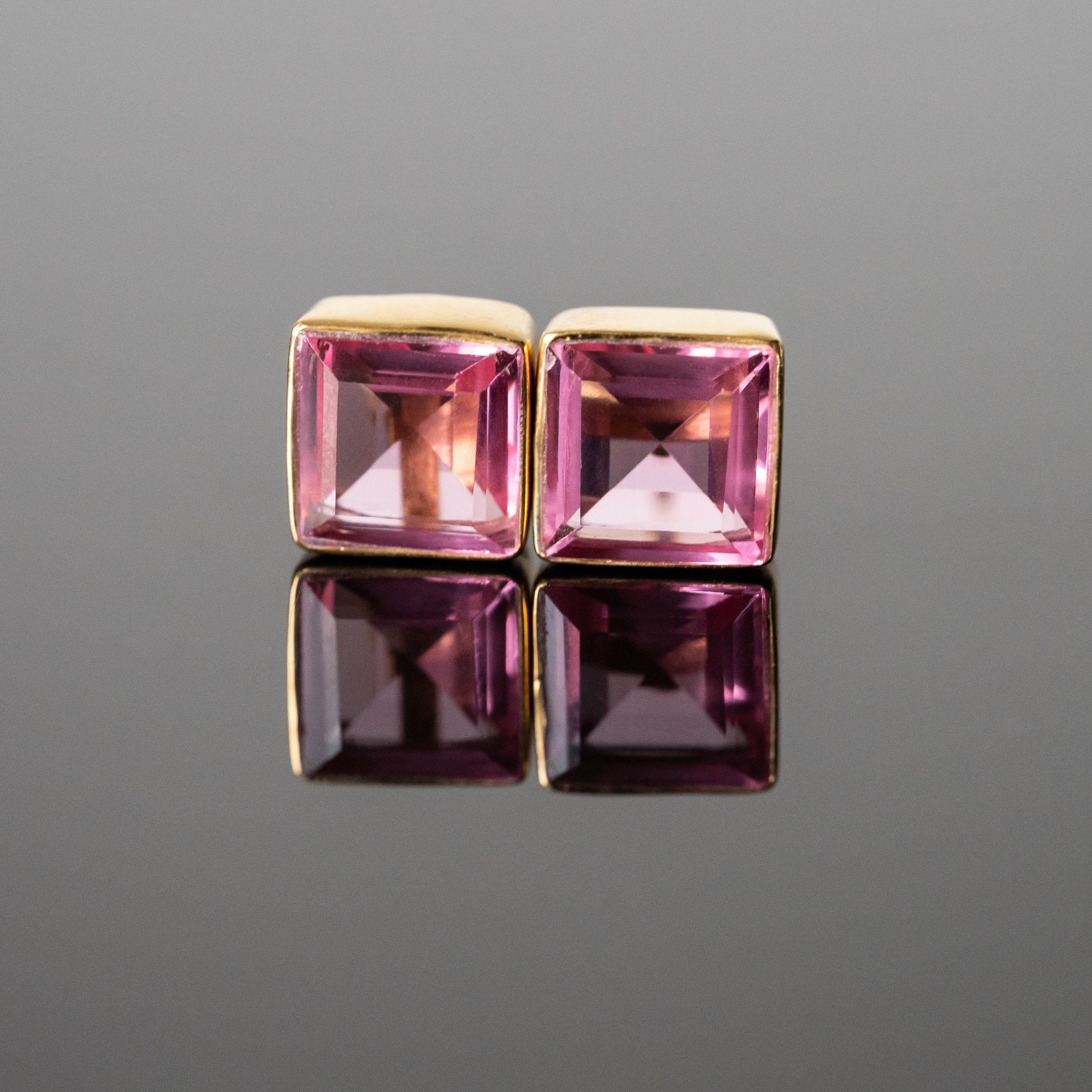 Nicole Tourmaline Square Studs featuring pink tourmaline stones set in gold-plated sterling silver, elegantly designed for unique style.