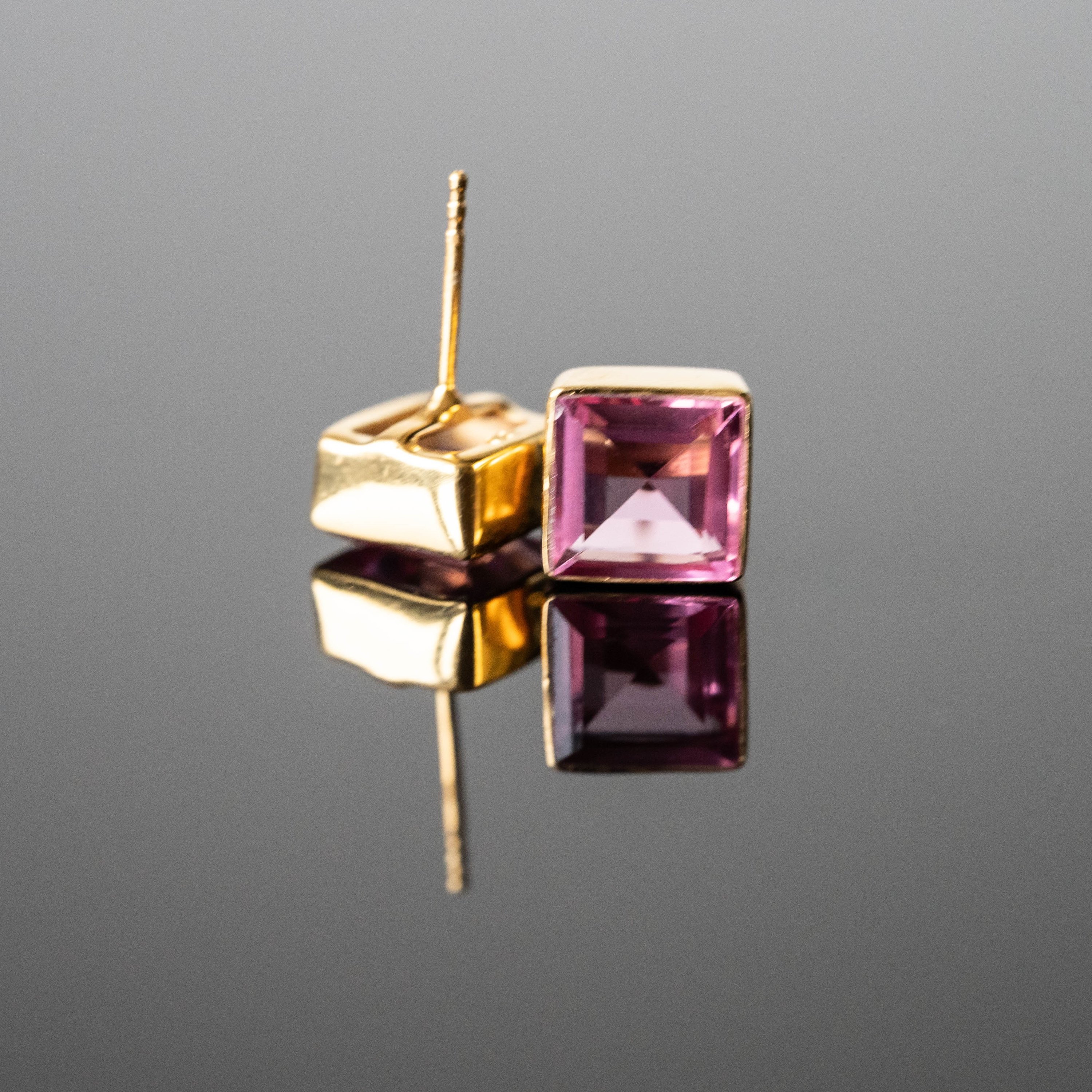 Nicole Tourmaline Square Studs featuring pink tourmaline stones set in gold-plated sterling silver, elegantly designed for unique style.