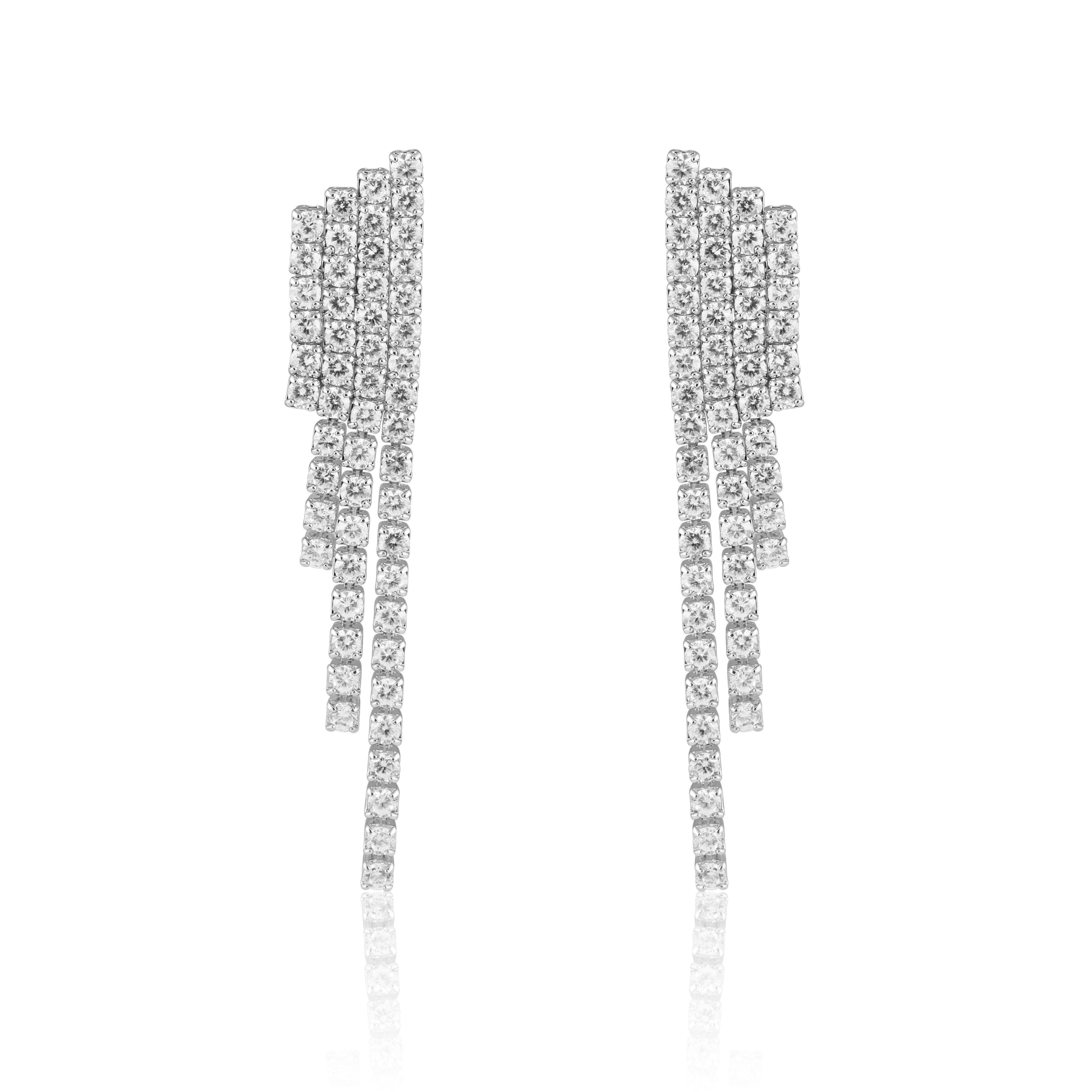 Nikki Statement Earrings featuring stainless steel and sparkling cubic zirconia accents, showcasing a 2-inch drop design.