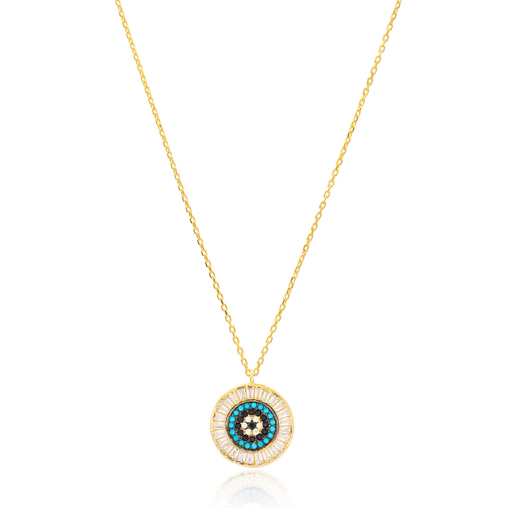 NIMA Necklace featuring a vibrant medallion pendant with turquoise beads and baguette stones, crafted in 925 sterling silver with yellow gold plating.